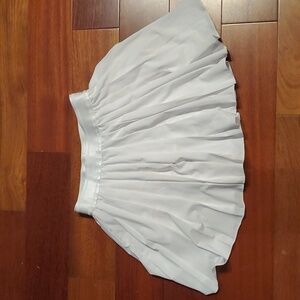 Flirty white tennis skort